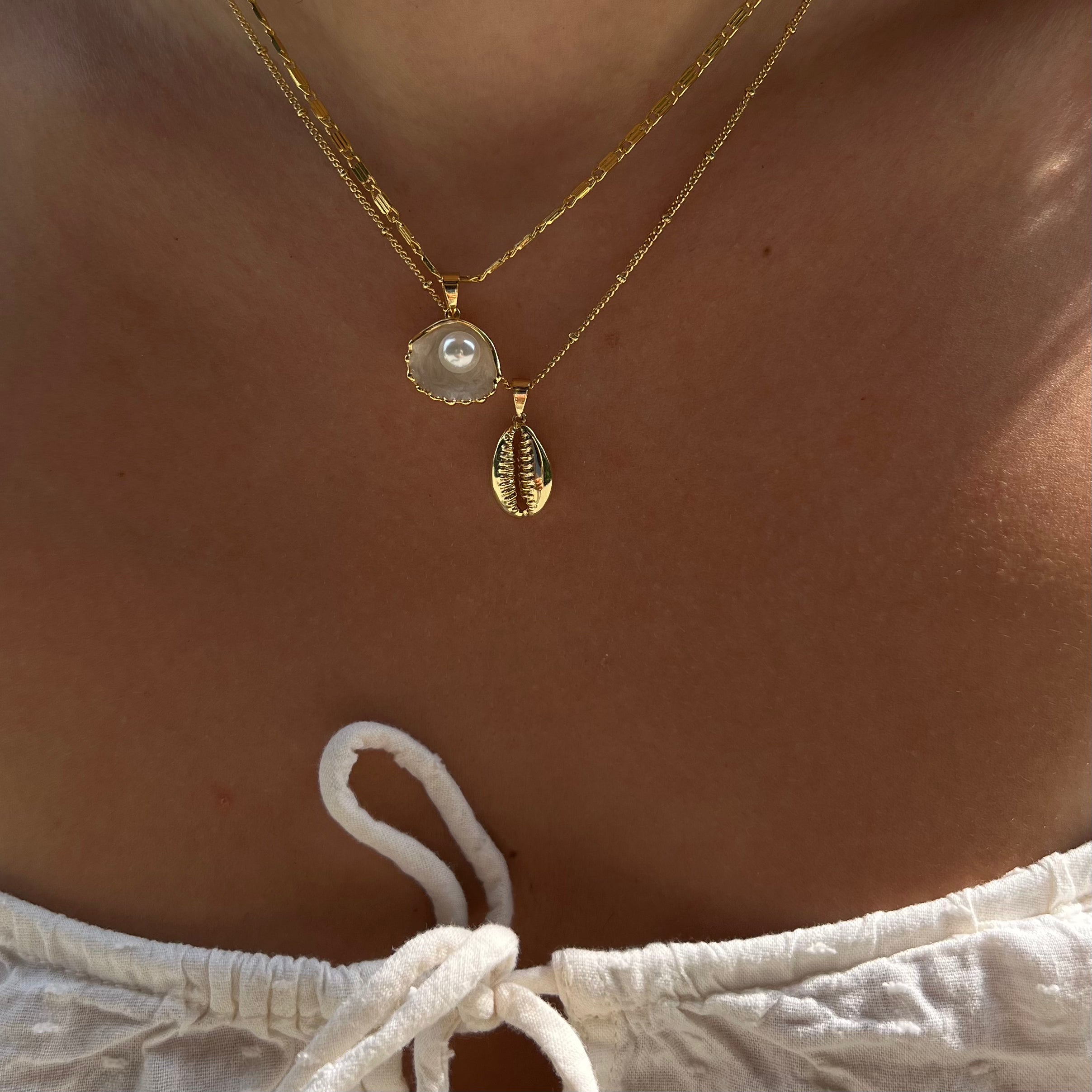 Cowrie Charm – Coastal Elegance Redefined