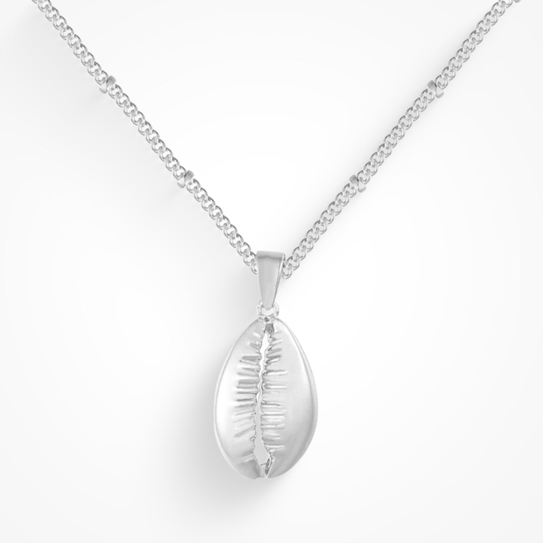 Cowrie Charm – Coastal Elegance Redefined