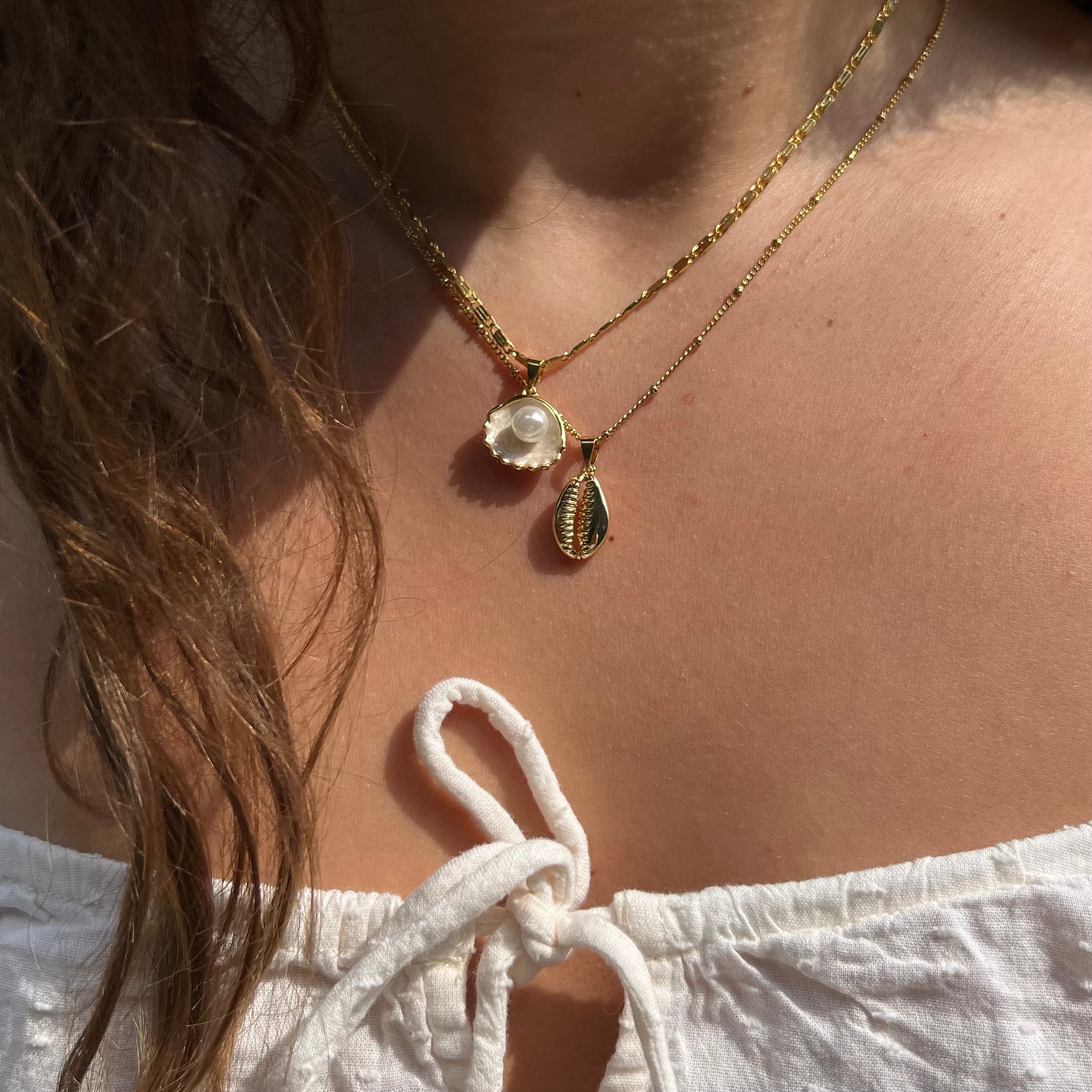 Cowrie Charm – Coastal Elegance Redefined
